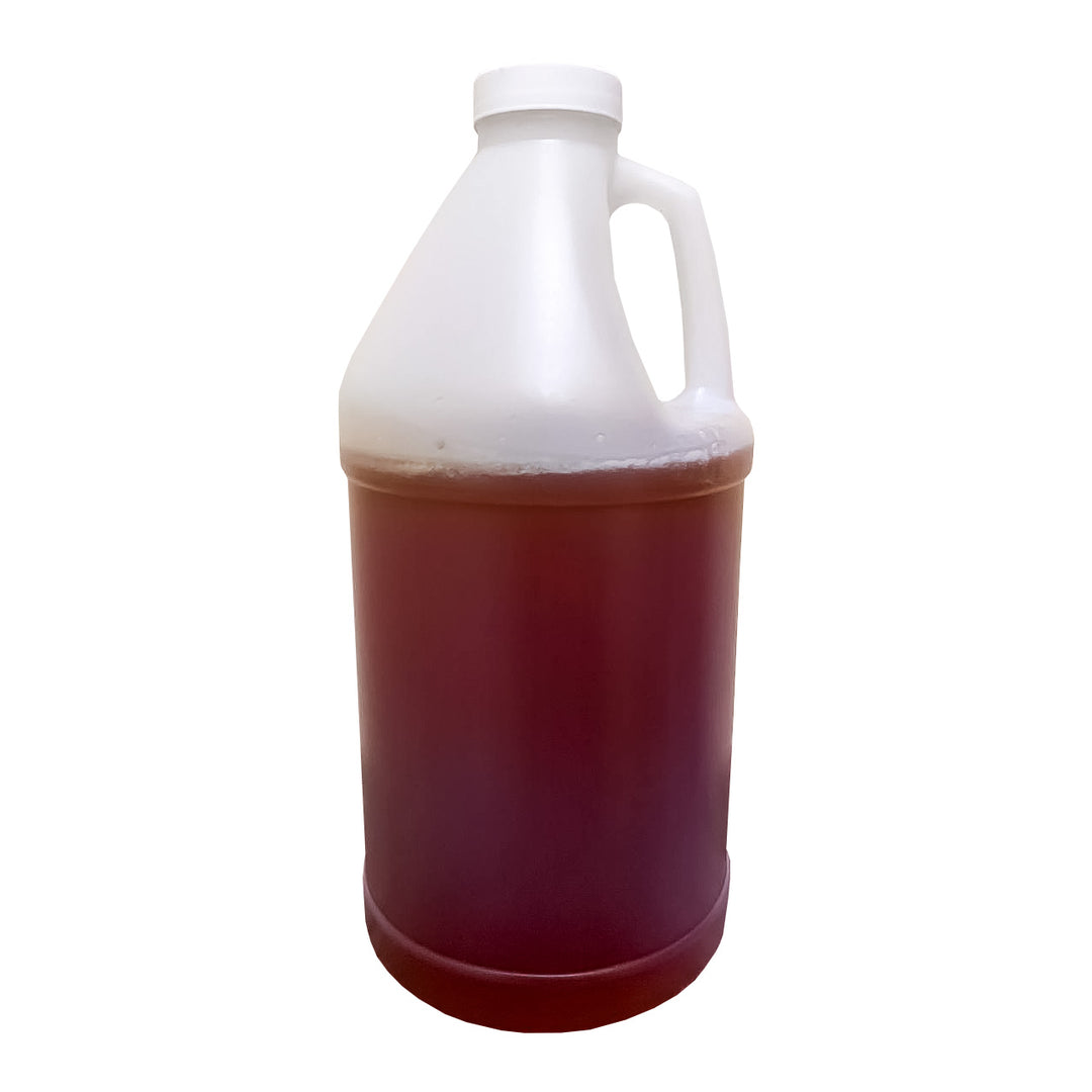Bottle of 6 lb filled with honey