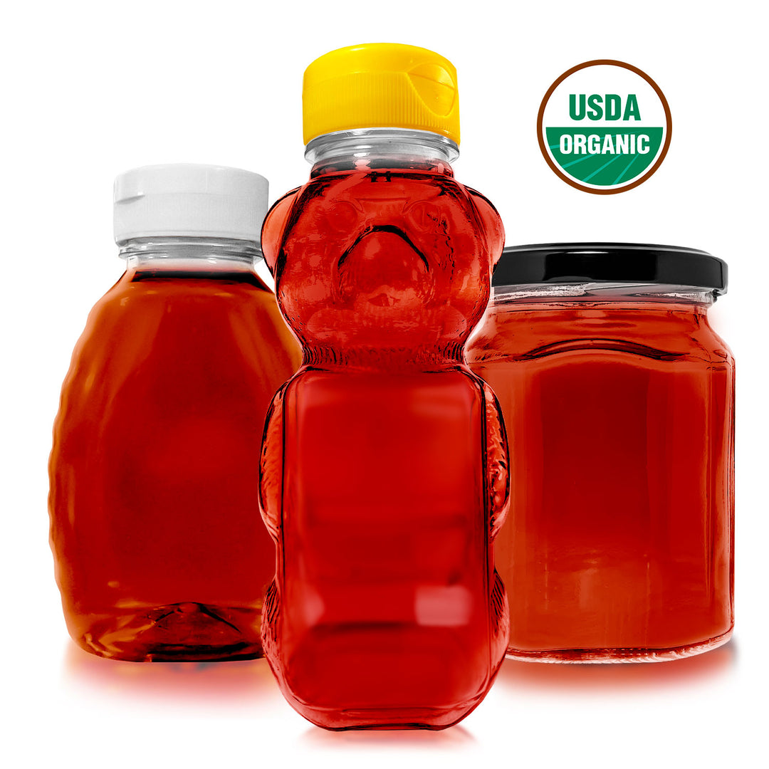 USDA Organic honey displayed in three retail packaging styles, including squeeze bottles and a glass jar filled with rich amber honey.